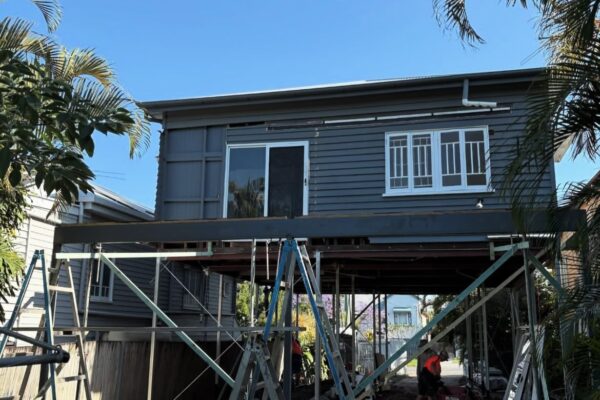 Custom home renovation in Brisbane featuring a house raise and build under construction. Jensen Constructions specialises in transforming sloping and difficult sites into functional living spaces.